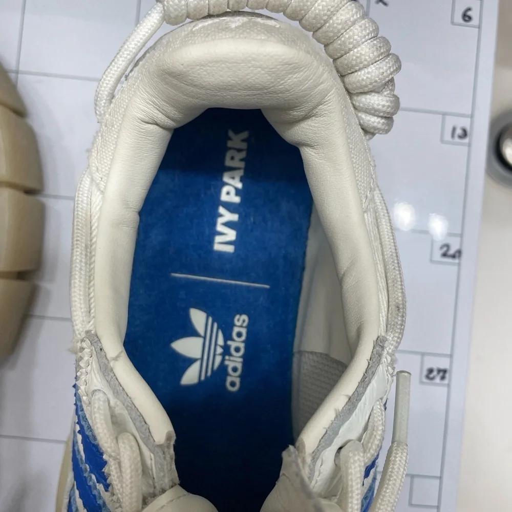 Size 7/5- adidas Ivy Park x Super Super Sleek Rodeo - Glow Blue W